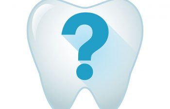 Drawing of a tooth with a question mark on top