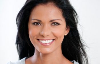 A woman with bright, white teeth